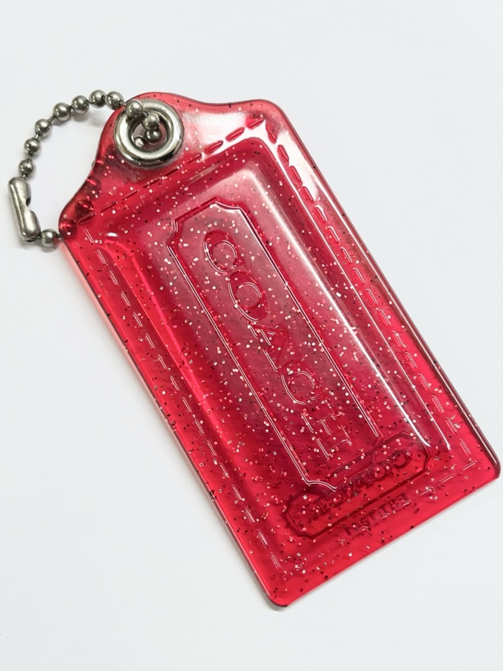 Coach Poppy Red Clear with Silver Glitter Hang Tag 3 1/2 inches wide EUC